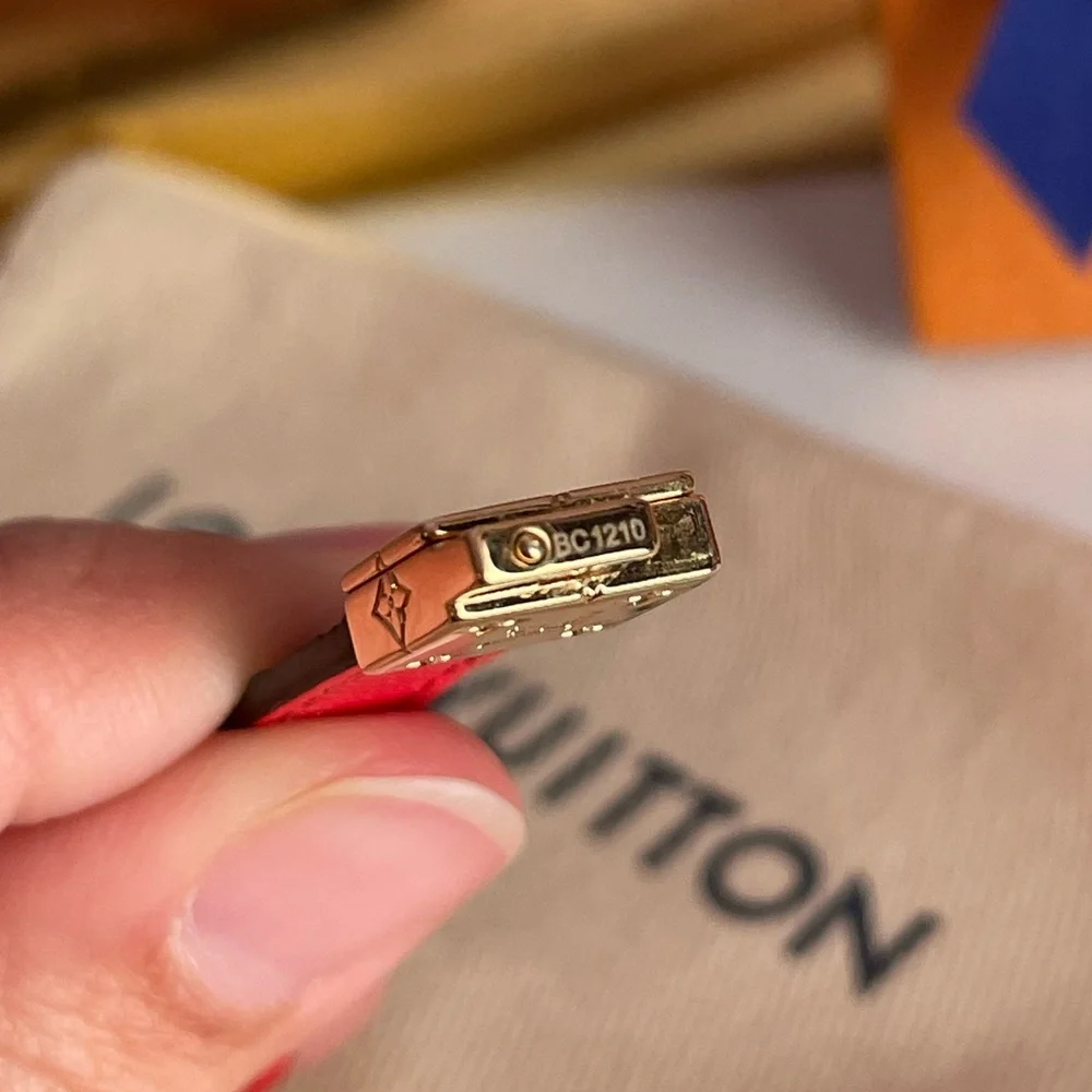Authentic Louis Vuitton LV Circle Reversible Monogram Leather Bracelet with Gold